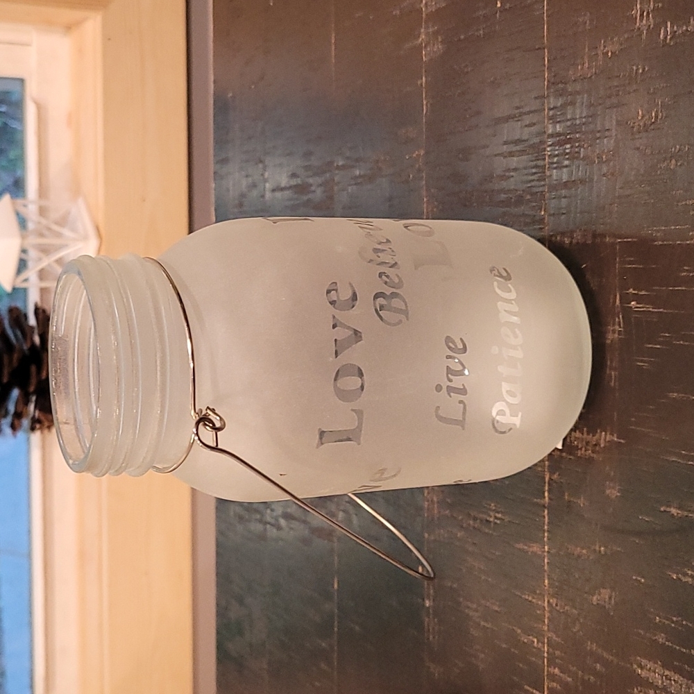 Beautiful glass jars, with metal handle